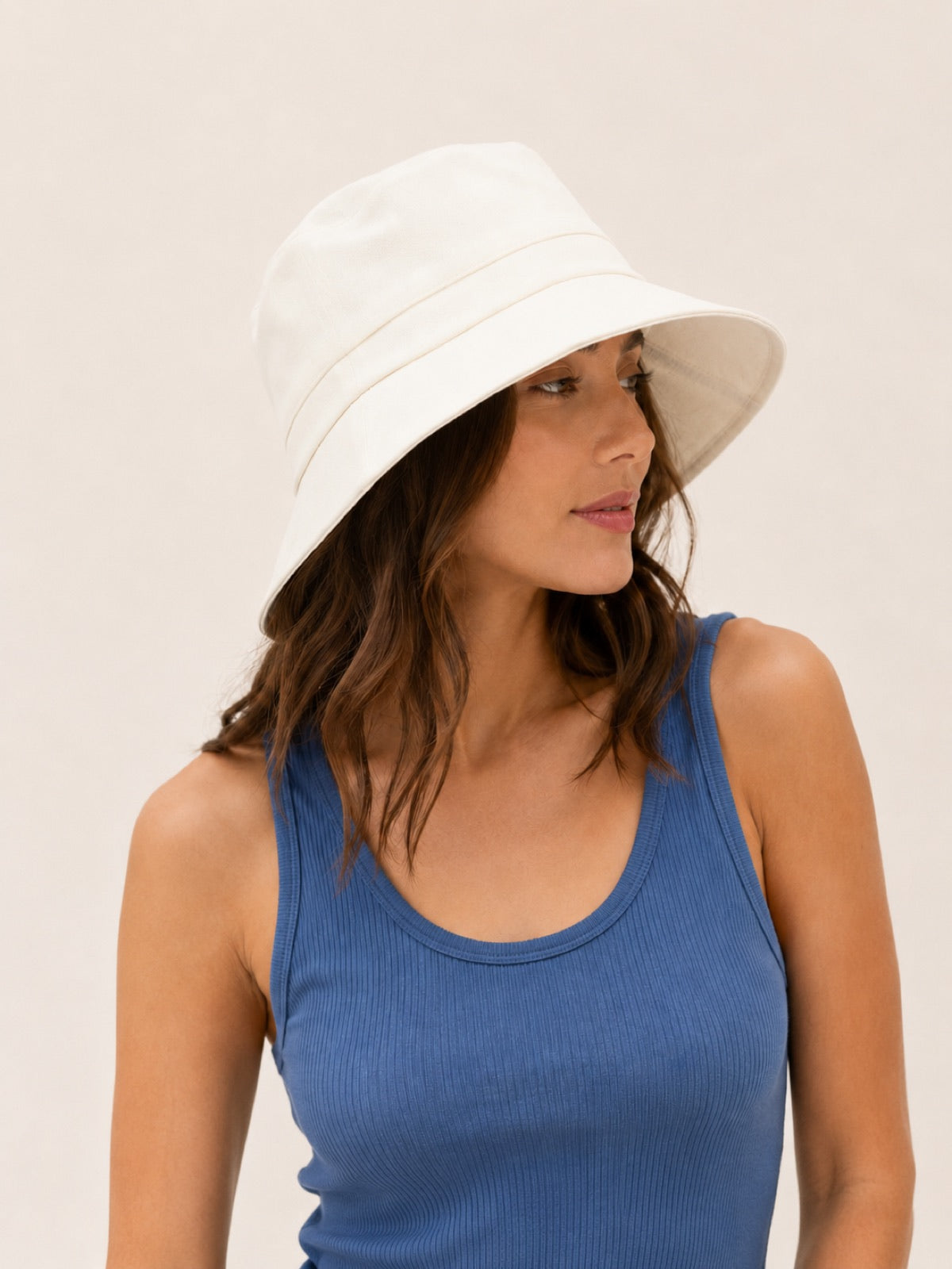Reversible Linen Bucket Hat for Women – Beige, worn by model, 2-in-1 reversible sun hat