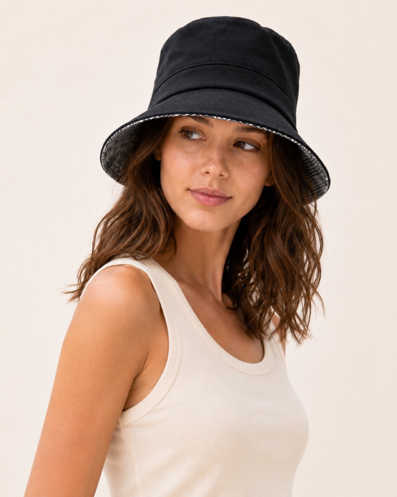 Reversible Linen Bucket Hat for Women – Black, worn by model, 2-in-1 reversible sun hat