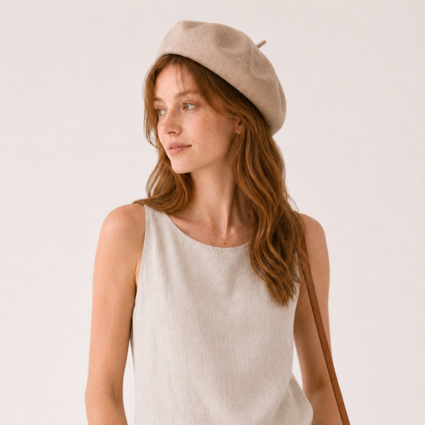 Woman wearing camel linen beret