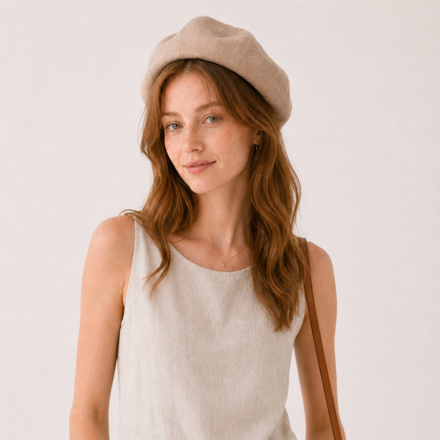 Woman wearing camel linen beret