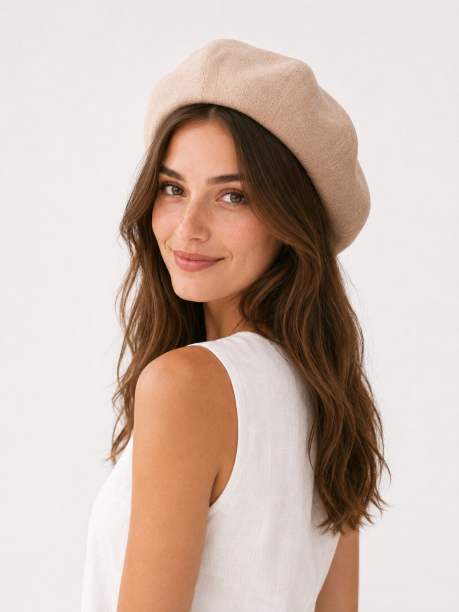 Woman wearing camel linen beret