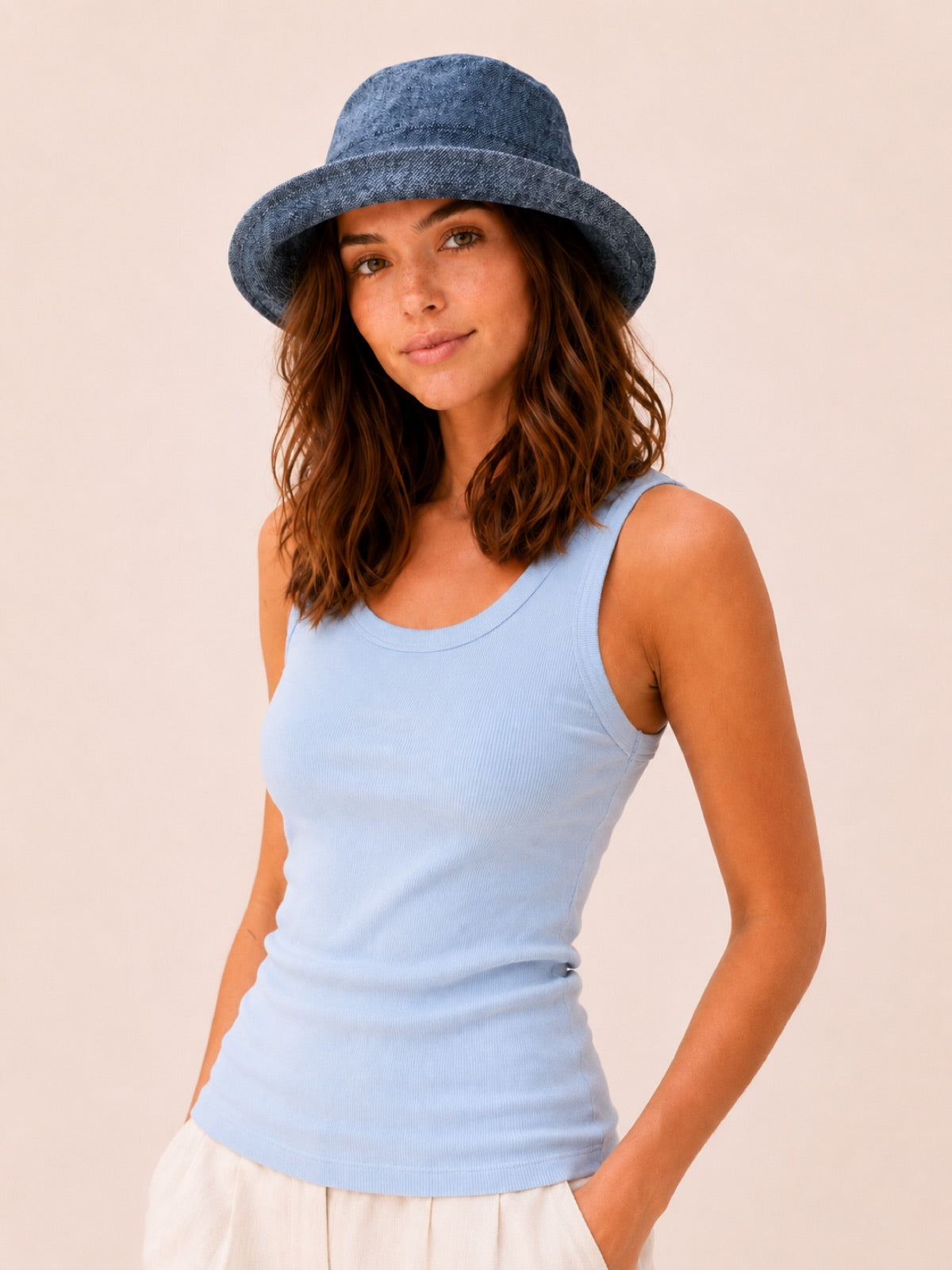 Reversible Linen Bucket Hat for Women – Denim Linen, worn by model, 2-in-1 reversible sun hat