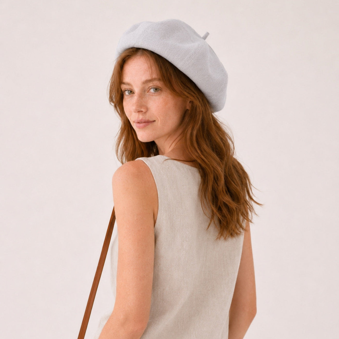 Woman wearing gray linen beret