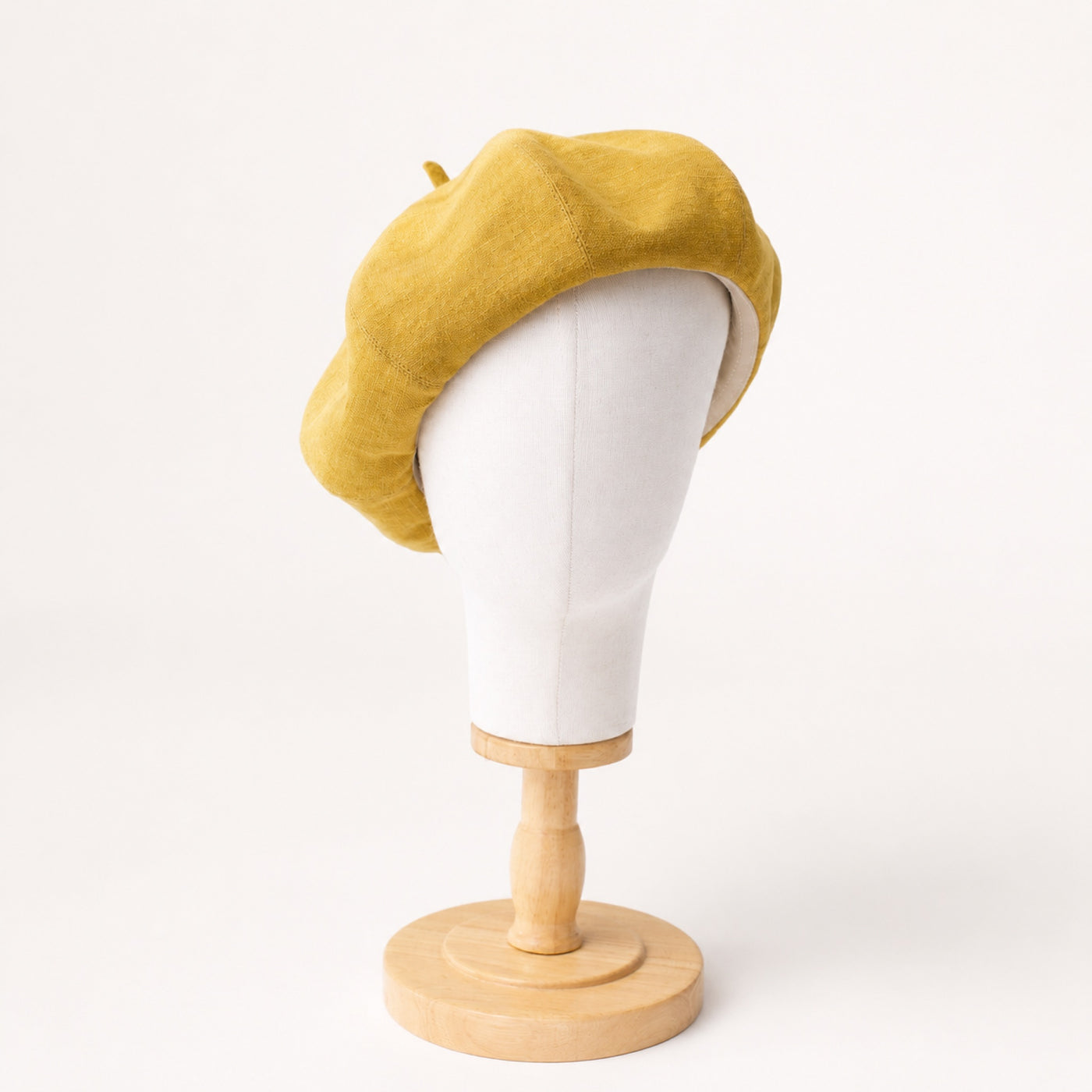 Mustard linen beret top eight-panel view