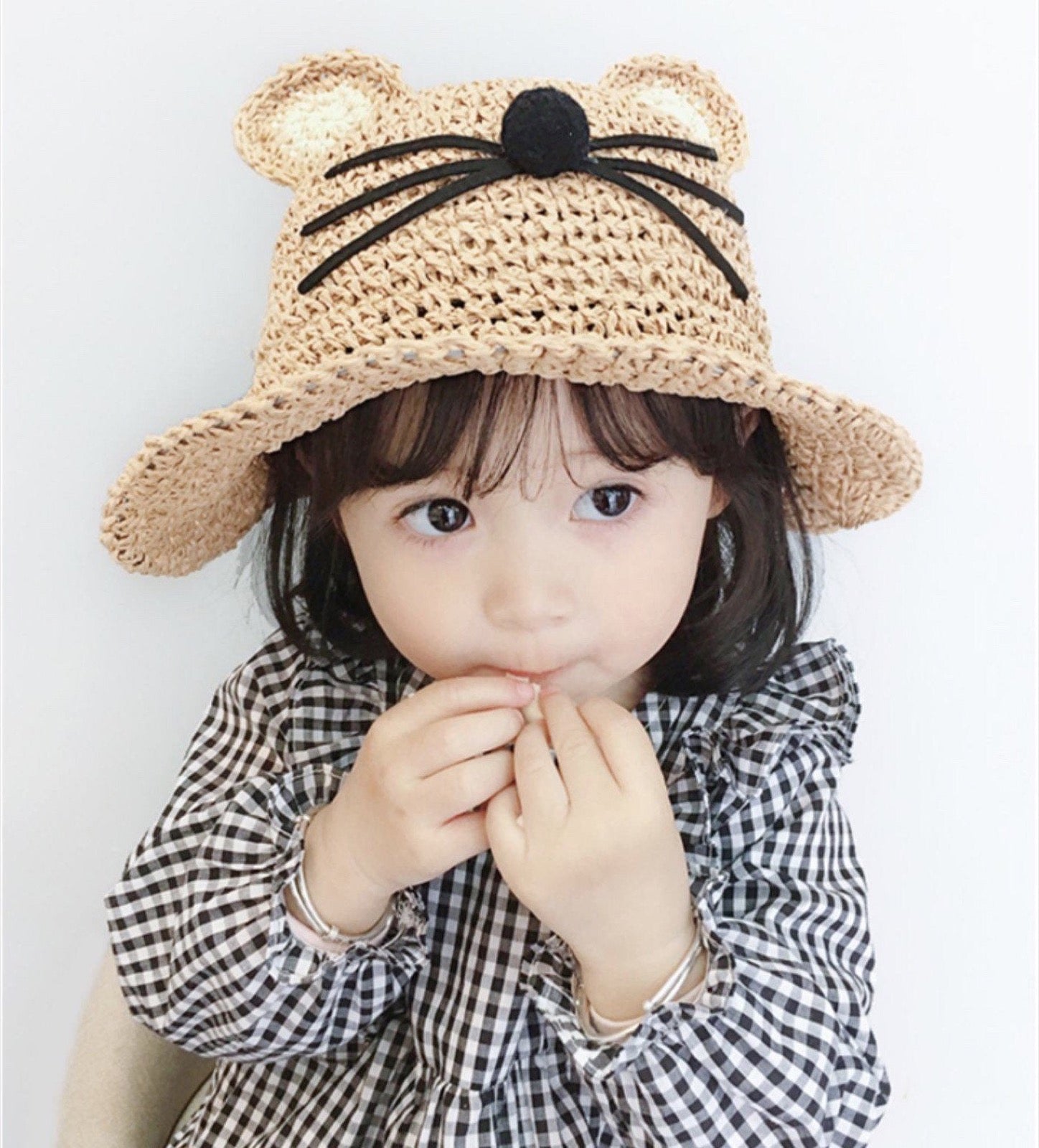 Cat Ear Straw Hat on toddler girl - Beige cat close-up front view with whiskers