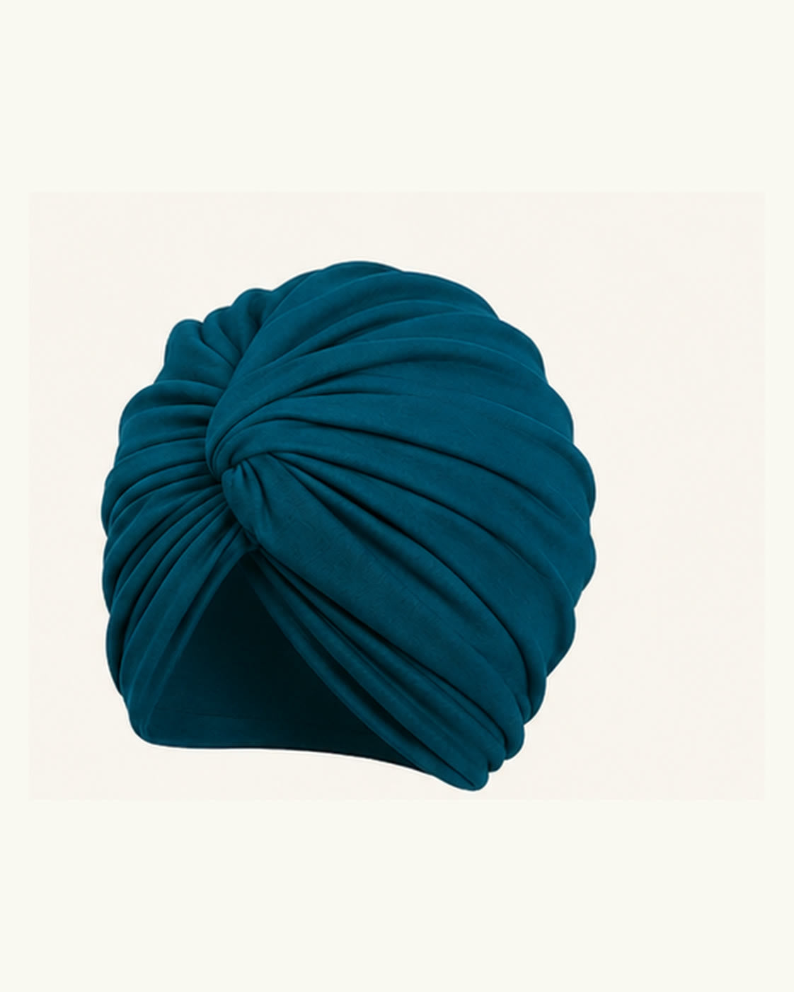 Peacock Blue modal cotton knot turban head wrap on an off-white background