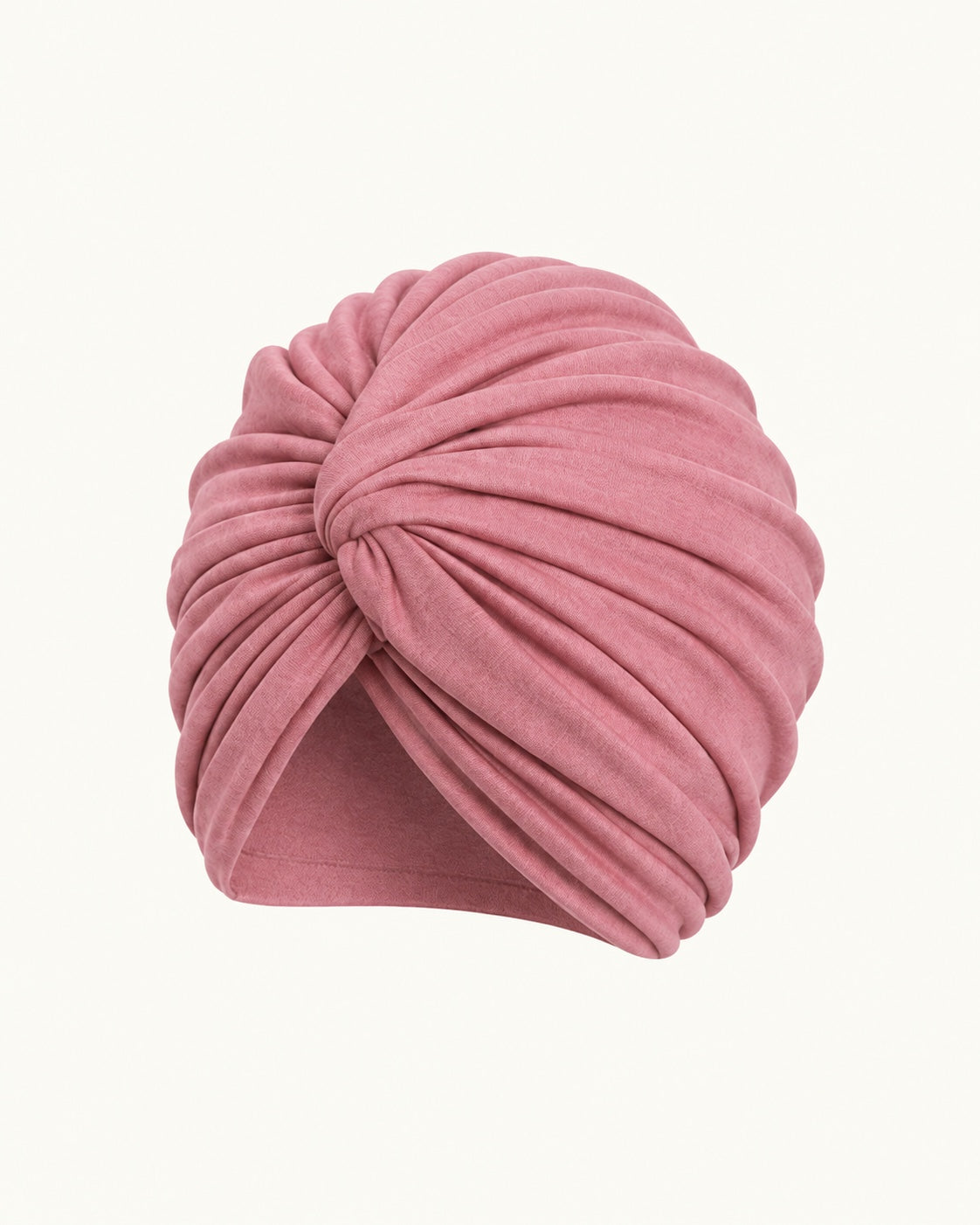 Pink modal cotton knot turban head wrap on an off-white background