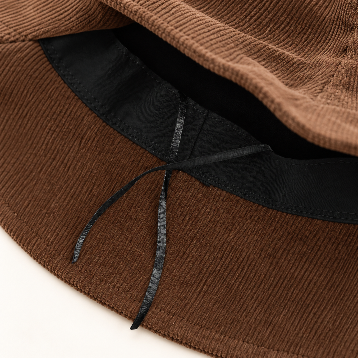 Pleated corduroy bucket hat - adjustment detail