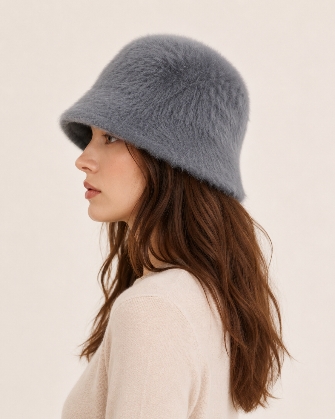 Smoke grey rabbit-hair blend bucket hat on a woman, side profile