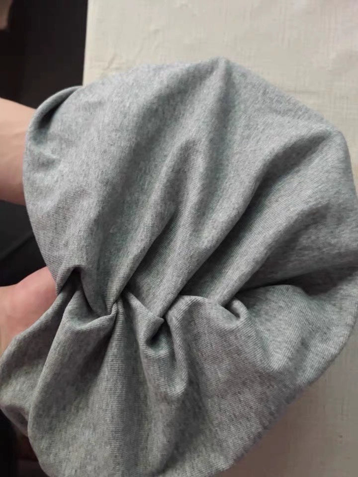 Close-up of the soft grey modal cotton turban hair wrap fabric