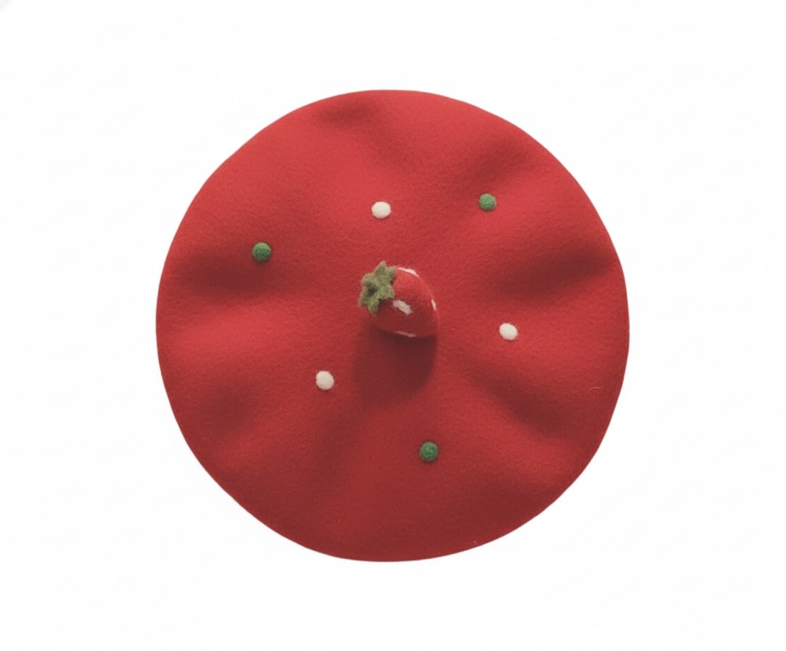 Strawberry wool beret flat lay on white background showing full shape and decoration