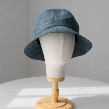 Custom linen bucket hat.