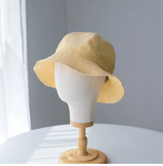 Custom linen bucket hat.