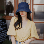 Wide Brim Bucket Hat.
