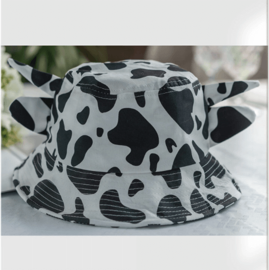 Cow print bucket hat.