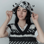 Cow print bucket hat.