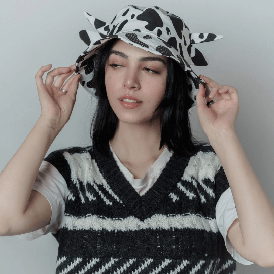 Cow print bucket hat.