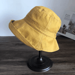 Wide Brim Bucket Hat.