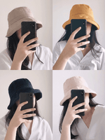 Wide Brim Bucket Hat.