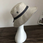 Reversible Pony Tail Sun Hat with Flower Print.