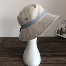 Load image into Gallery viewer, Reversible Pony Tail Sun Hat with Flower Print.