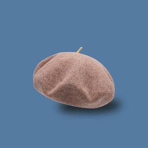 Classic French wool Beret with Metal Tip.