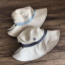 Load image into Gallery viewer, Reversible Pony Tail Sun Hat with Flower Print.