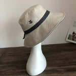 Reversible Pony Tail Sun Hat with Flower Print.