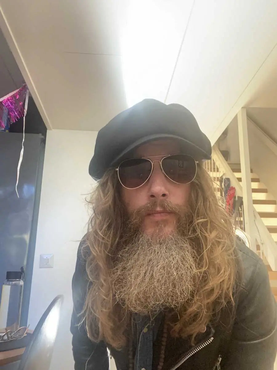 Niklas wearing his oversized newsboy hat